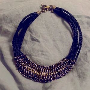 Cool chin and rope necklace.